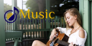 Young woman relaxing on a gazebo bench, gently playing an acoustic guitar, Music City Detox logo beside her