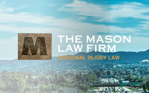 City freeway with mountains under blue sky, overlaid The Mason Law Firm logo and Personal Injury Law text