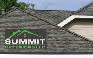 Close-up view of a residential roof with gray shingles, featuring the Summit Exteriors LLC company logo in green and white